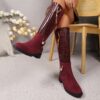 Newness Crimson V Chain Burgundy Knee Boots Elevate your style with these luxurious burgundy knee high boots featuring a striking V chain detail