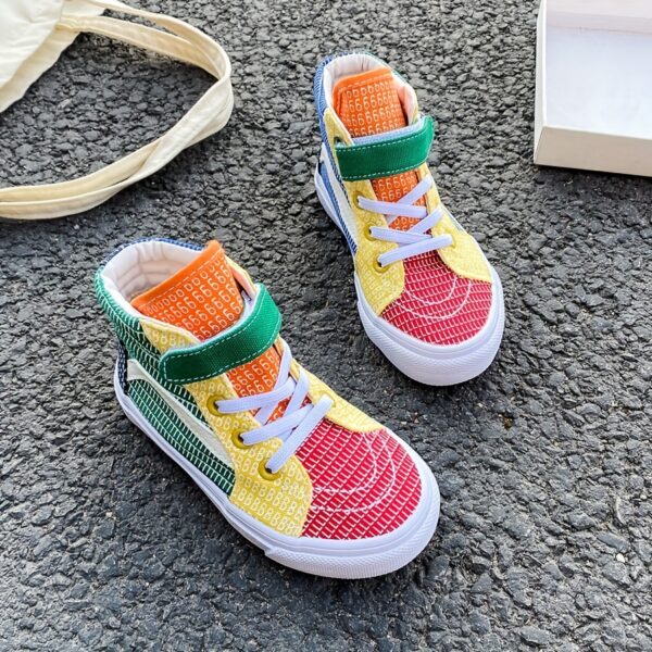 Newness Rainbow Retro Canvas Sneakers: Stylish and comfortable kids' sneakers, perfect for spring and fall. Lightweight and breathable canvas design in a vibrant rainbow color scheme.