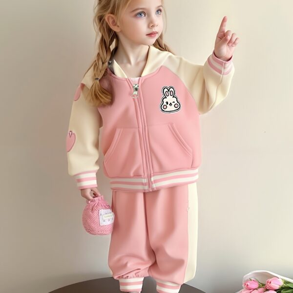 Adorable Spring Blossom Girls' Tracksuit, perfect for outdoor play. A charming pink and floral tracksuit, ideal for spring and summer.
