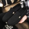Newness Metropolitan Mens Slip On Loafers in classic black featuring breathable fabric a durable PU sole and stylish golden accents Perfect for everyday wear