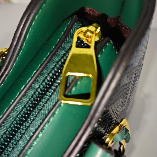 Emerald Envy Snakeskin Crossbody Bag by Newness. A chic, modern, and luxuriously designed crossbody bag in emerald green snakeskin.
