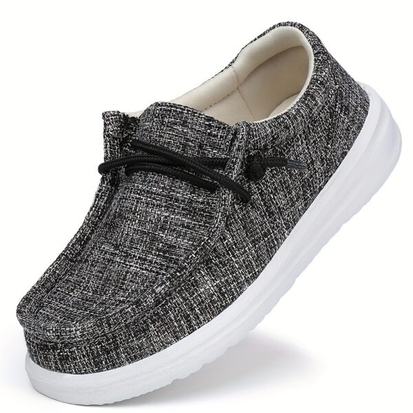 Stylish Newness Striped Canvas Kids' Slip-Ons in classic navy and white stripes. Lightweight and breathable, perfect for kids' everyday wear.