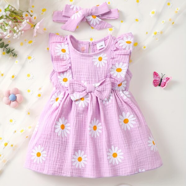 Adorable BrownBark daisy dress set perfect for summer. This cute and stylish outfit features a charming daisy print and is ideal for warm weather.