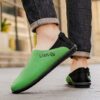 Newness Lian Di Mens Slip On Loafers in navy blue showcasing their breathable design and effortless style Perfect for any occasion