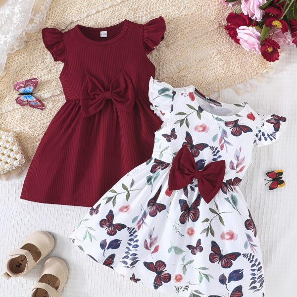Adorable Summer Bloom Baby Girl Dress Set: A charming two-piece outfit in soft, summery colors, perfect for warm weather.