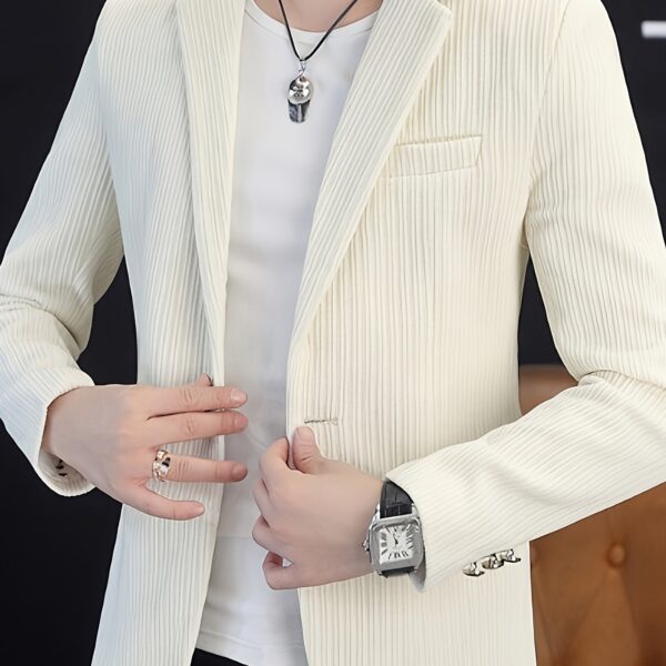The Cairo Men's Corduroy Blazer in deep brown, a sophisticated and stylish men's blazer made from premium corduroy, perfect for any occasion. Model wearing the blazer.