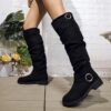 Newness Slouchy Knee High Boots in brown leather showcasing a chic and casual style perfect for winter The boots are slouchy and knee high highlighting their comfortable and fashionable design
