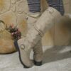 Newness Slouchy Knee High Boots in brown leather showcasing a chic and casual style perfect for winter The boots are slouchy and knee high highlighting their comfortable and fashionable design