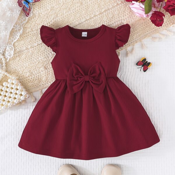 Adorable Summer Bloom Baby Girl Dress Set: A charming two-piece outfit in soft, summery colors, perfect for warm weather.