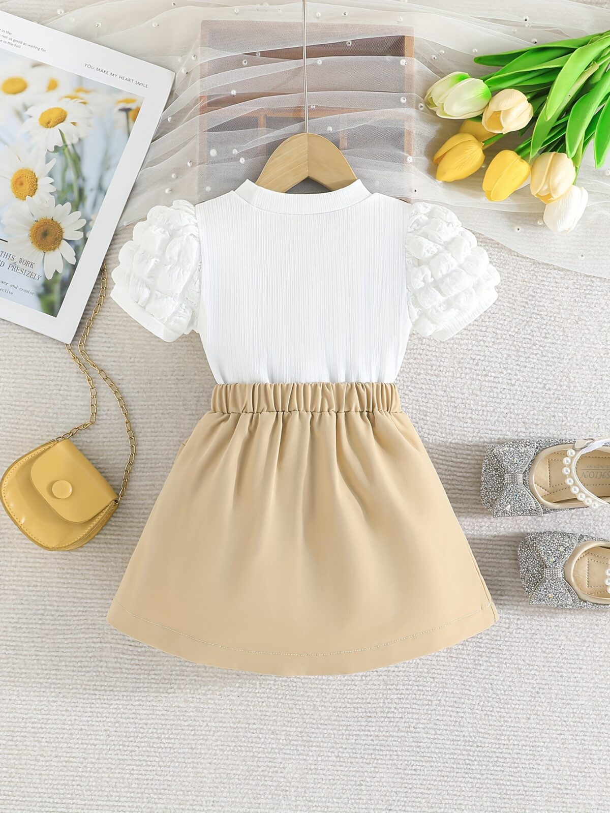 Adorable Pastel Dream Girls Summer Set featuring a pastel colored top and bottom perfect for summer The outfit is shown on a young girl highlighting its comfortable and stylish design