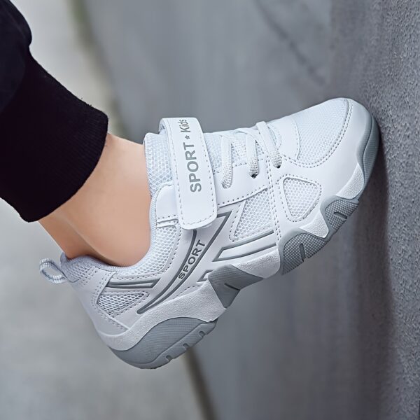 Stylish and comfortable Velocity Boys' Sports Shoes in action, perfect for active kids. Showcasing the shoe's design and vibrant colors.