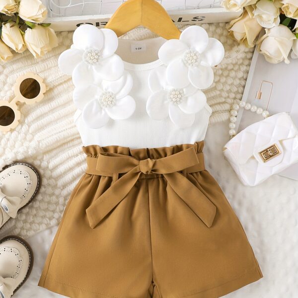 Adorable Summer Bloom Floral Girls' Set, perfect for outdoor play. Featuring a pretty floral print, this two-piece set includes a comfortable top and shorts.