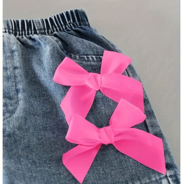 Adorable girls denim set with a cute bowknot, perfect for spring, summer, or fall. Shop Newness for stylish kids' fashion.
