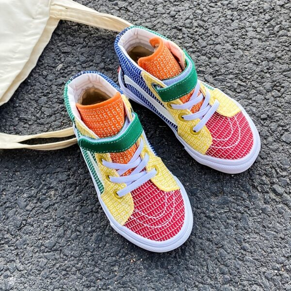 Newness Rainbow Retro Canvas Sneakers: Stylish and comfortable kids' sneakers, perfect for spring and fall. Lightweight and breathable canvas design in a vibrant rainbow color scheme.