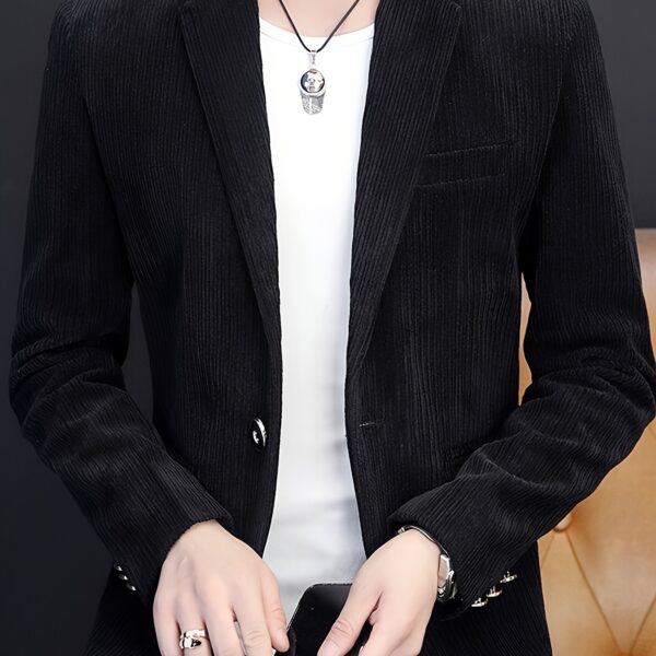The Cairo Men's Corduroy Blazer in deep brown, a sophisticated and stylish men's blazer made from premium corduroy, perfect for any occasion. Model wearing the blazer.