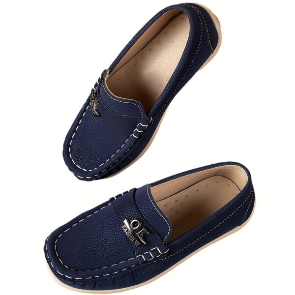 Stylish and comfortable Newness Classic Boys' Loafers, perfect for any occasion. A close-up shot showcasing the loafers' design and quality.