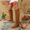 Stylish embroidered cowboy boots from Newness perfect for adding a touch of western flair to any outfit