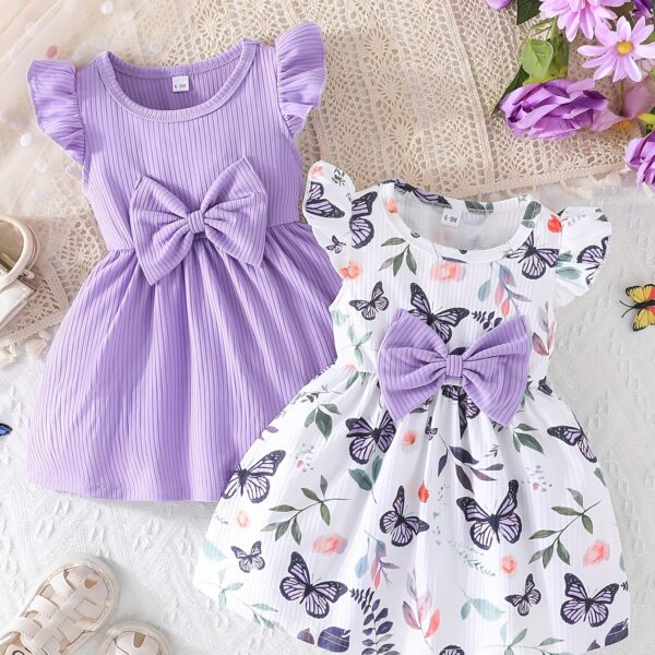 Adorable Summer Bloom Baby Girl Dress Set: A charming two-piece outfit in soft, summery colors, perfect for warm weather.