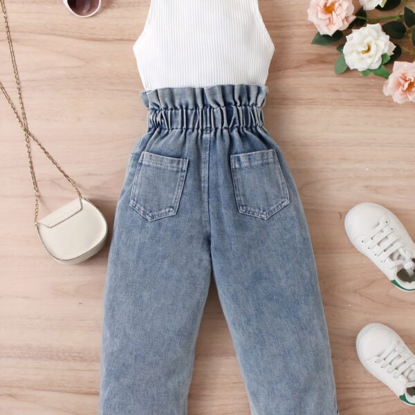 Adorable girls denim set from Newness, perfect for spring, summer, or fall. Features a stylish design and comfortable fit.