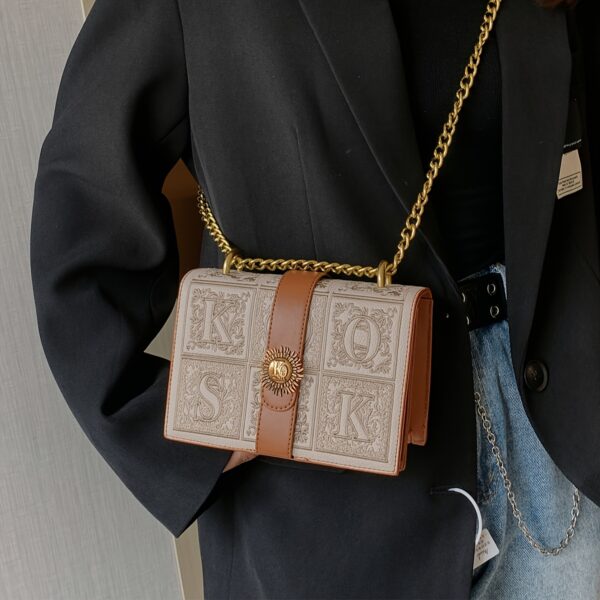 Newness Celestial Sun Embroidered Chain Bag: A chic, versatile chain bag with celestial sun embroidery, perfect for elevating any outfit.