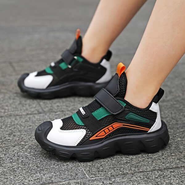 Newness Velocity Stripe Boys' Running Shoes: Lightweight, breathable running shoes perfect for school and play. Image shows stylish blue and white striped shoes.