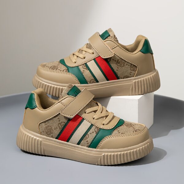 Stylish and vibrant color-block striped kids' sneakers by Newness. Lightweight and durable, perfect for everyday wear.