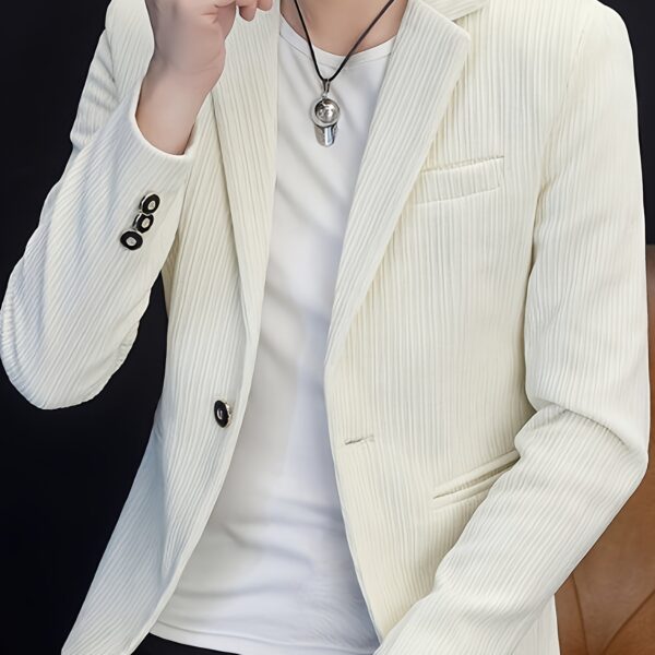 The Cairo Men's Corduroy Blazer in deep brown, a sophisticated and stylish men's blazer made from premium corduroy, perfect for any occasion. Model wearing the blazer.