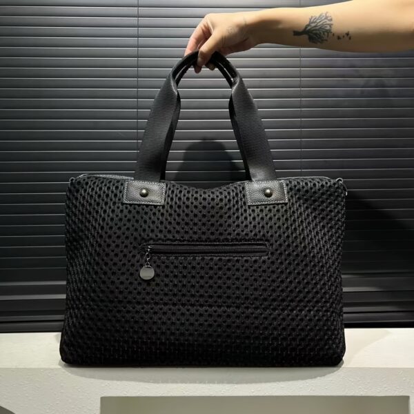 Newness Urban Edge Mesh Nylon Bag: A stylish and durable mesh nylon bag, perfect for everyday use. Shows off its modern design and spacious interior.