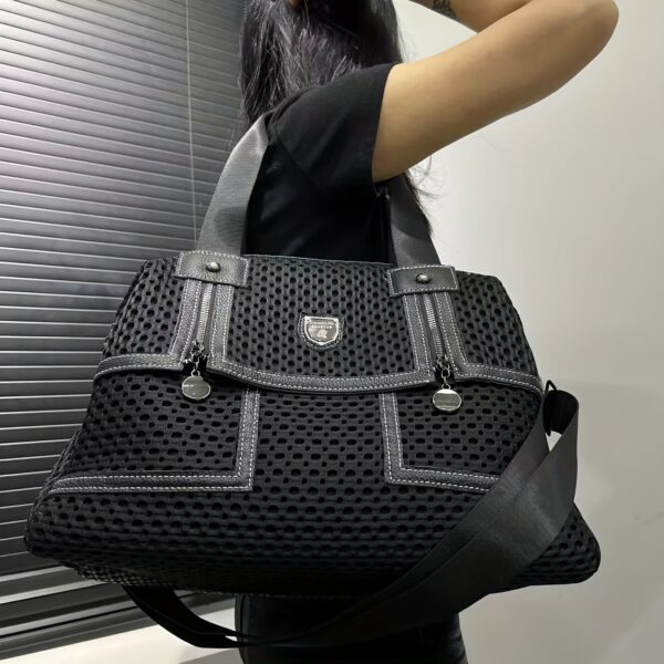 Newness Urban Edge Mesh Nylon Bag: A stylish and durable mesh nylon bag, perfect for everyday use. Shows off its modern design and spacious interior.