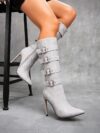 Newness Ascension Stiletto Buckle Boots Elevate your look with these stunning stiletto boots featuring a chic buckle detail