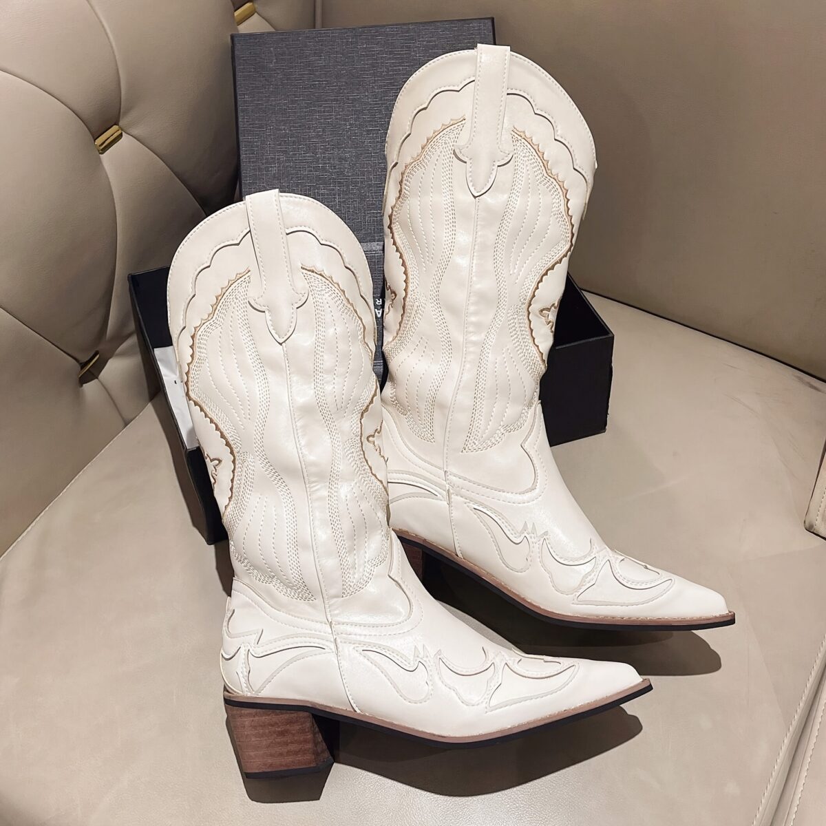 Stylish Embroidered Western Cowboy Boots from Newness perfect for any season These boots feature intricate embroidery and a classic silhouette