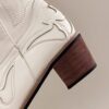 Stylish Embroidered Western Cowboy Boots from Newness perfect for any season These boots feature intricate embroidery and a classic silhouette