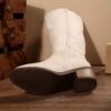 Newness Effortless Chic Winter Mid Calf Boots Stylish brown leather boots that reach mid calf perfect for any occasion The boots are shown from the side highlighting their sleek design and comfortable fit