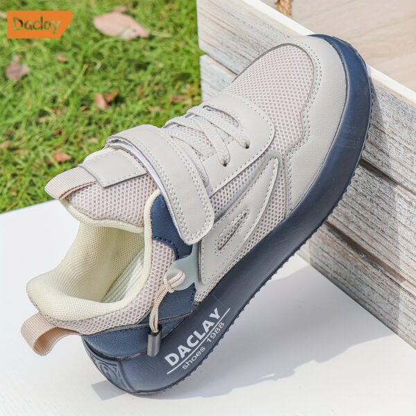 Stylish and comfortable DACLAY striped breathable boys' casual sneakers, perfect for all seasons. These shoes offer superior comfort and breathability.