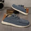 Newness Mens Effortless Style Fabric Loafers Breathable lightweight and effortlessly stylish loafers perfect for everyday wear Close up view showcasing the fabric texture and design