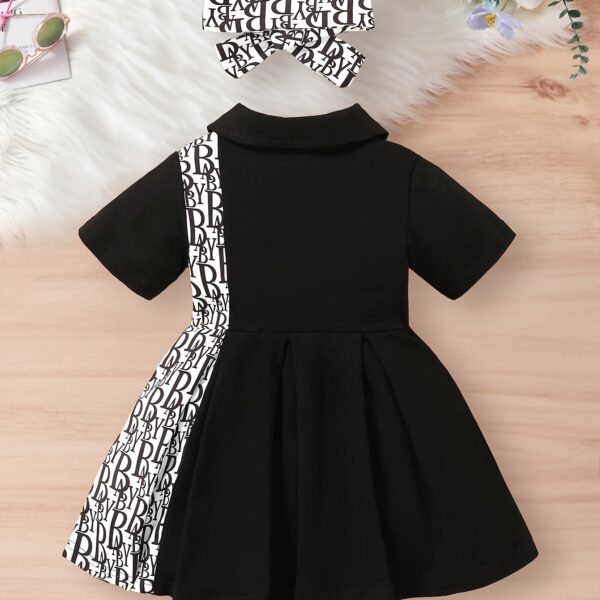 Adorable little girl wearing a stylish and comfy Newness summer letter print dress, perfect for a playdate.