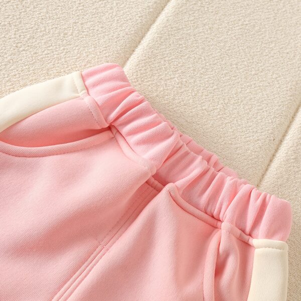Adorable Spring Blossom Girls' Tracksuit, perfect for outdoor play. A charming pink and floral tracksuit, ideal for spring and summer.