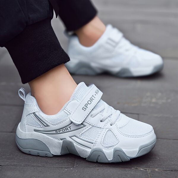 Stylish and comfortable Velocity Boys' Sports Shoes in action, perfect for active kids. Showcasing the shoe's design and vibrant colors.