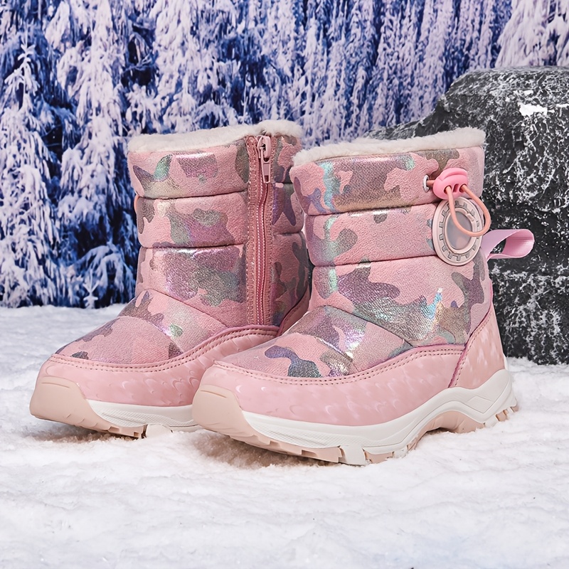 Stylish and warm Arctic Explorer Kids Snow Boots by Newness, perfect for winter adventures. Kids snow boots in action, showcasing their waterproof and insulated design.