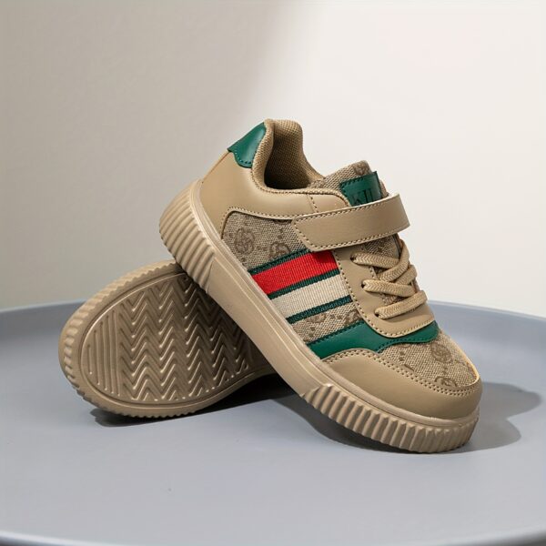Stylish and vibrant color-block striped kids' sneakers by Newness. Lightweight and durable, perfect for everyday wear.