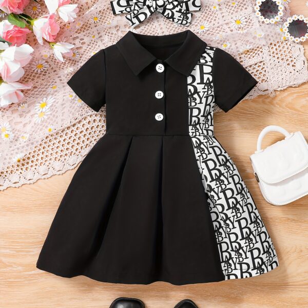 Adorable baby girl in a stylish and comfortable summer dress from Newness, perfect for a playdate.
