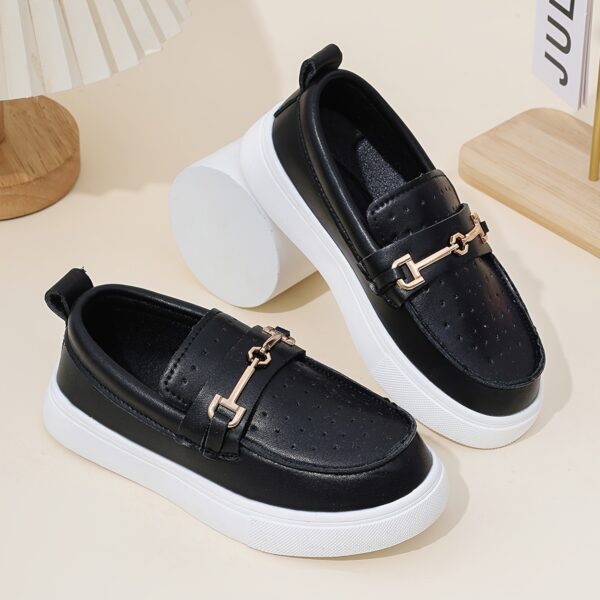 Stylish perforated boys loafers, perfect for any occasion. Comfortable and breathable design in a classic style.