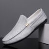 Newness Metropolitan Mens Slip On Loafers in classic black featuring breathable fabric a durable PU sole and stylish golden accents Perfect for everyday wear