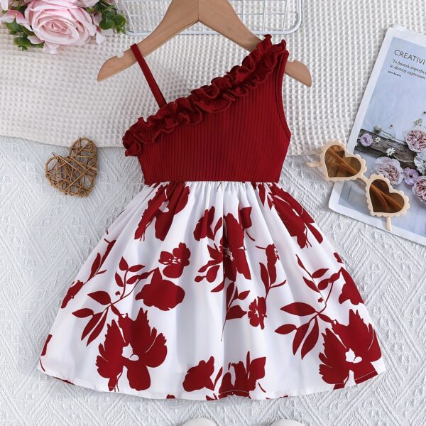 Adorable girl wearing a vibrant Summer Bloom floral print dress, perfect for summer vacations.