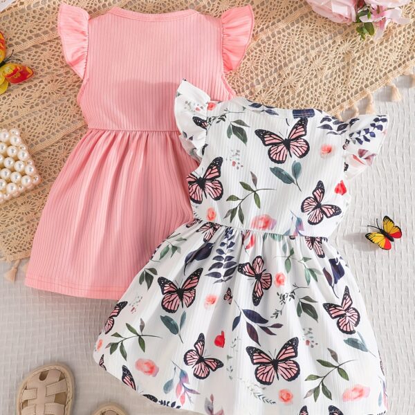 Adorable Summer Bloom Baby Girl Dress Set: A charming two-piece outfit in soft, summery colors, perfect for warm weather.