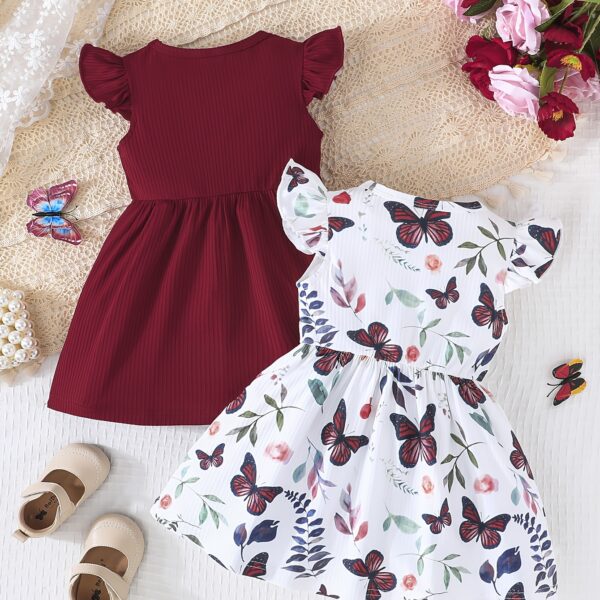 Adorable Summer Bloom Baby Girl Dress Set: A charming two-piece outfit in soft, summery colors, perfect for warm weather.