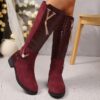 Newness Crimson V Chain Burgundy Knee Boots Elevate your style with these luxurious burgundy knee high boots featuring a striking V chain detail