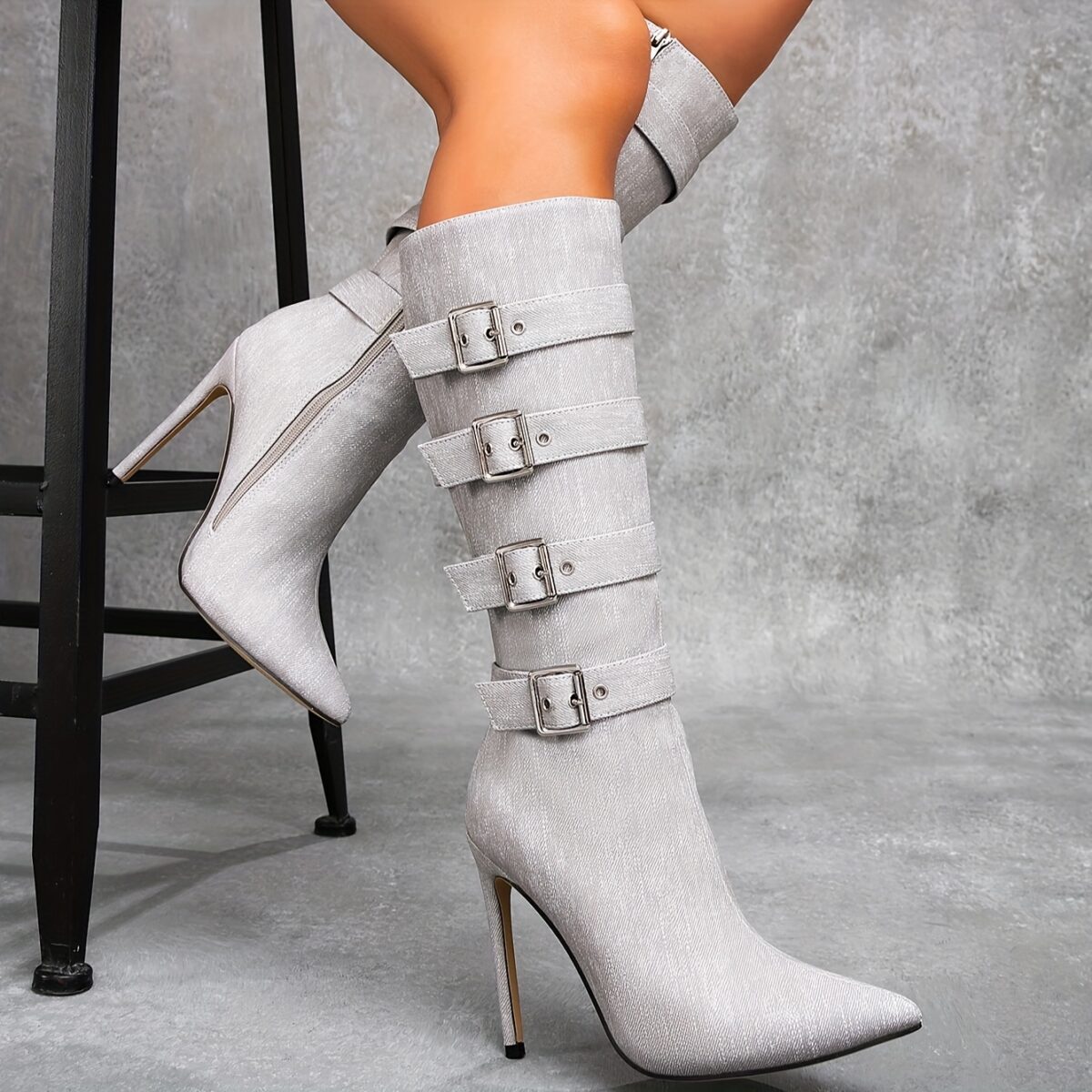 Newness Ascension Stiletto Buckle Boots Elevate your look with these stunning stiletto boots featuring a chic buckle detail