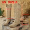Stylish embroidered cowboy boots from Newness perfect for adding a touch of western flair to any outfit
