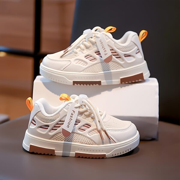 Stylish and breathable Newness Summer Breeze Kids Stripe Sneakers, perfect for spring, summer, and fall. Image shows kids' striped sneakers in a close-up.